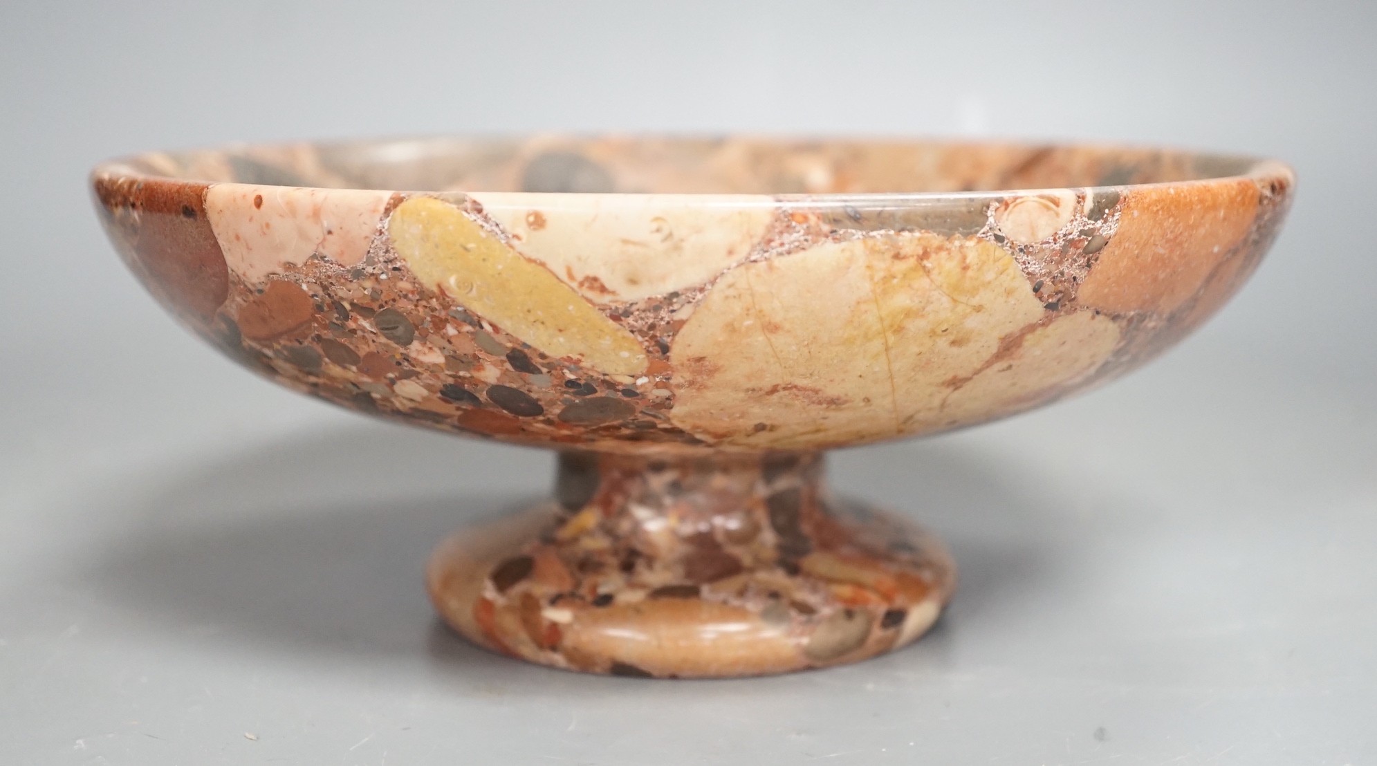 A small polished puddingstone tazza, 23cms diameter